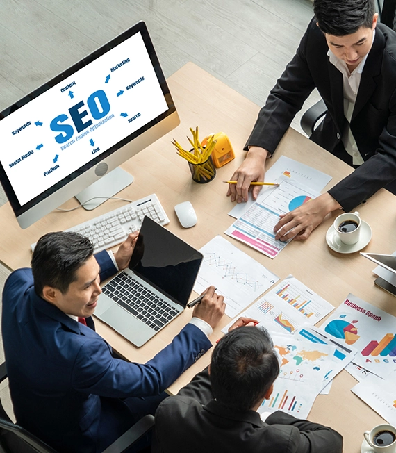 A dynamic team meeting where professionals strategize on SEO performance